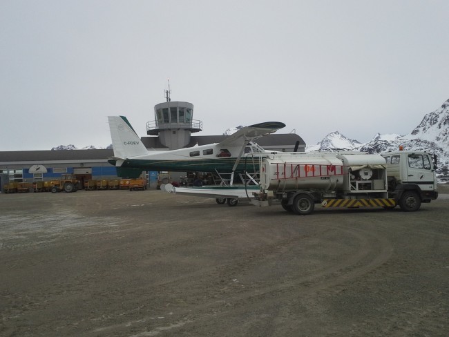 Fueling up with the terminal in the background